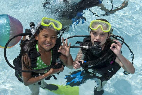 bubble makers getting ready to Experience scuba diving